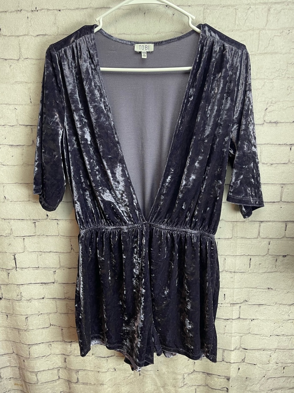 Tobi size medium blue gray velour romper deep v neck